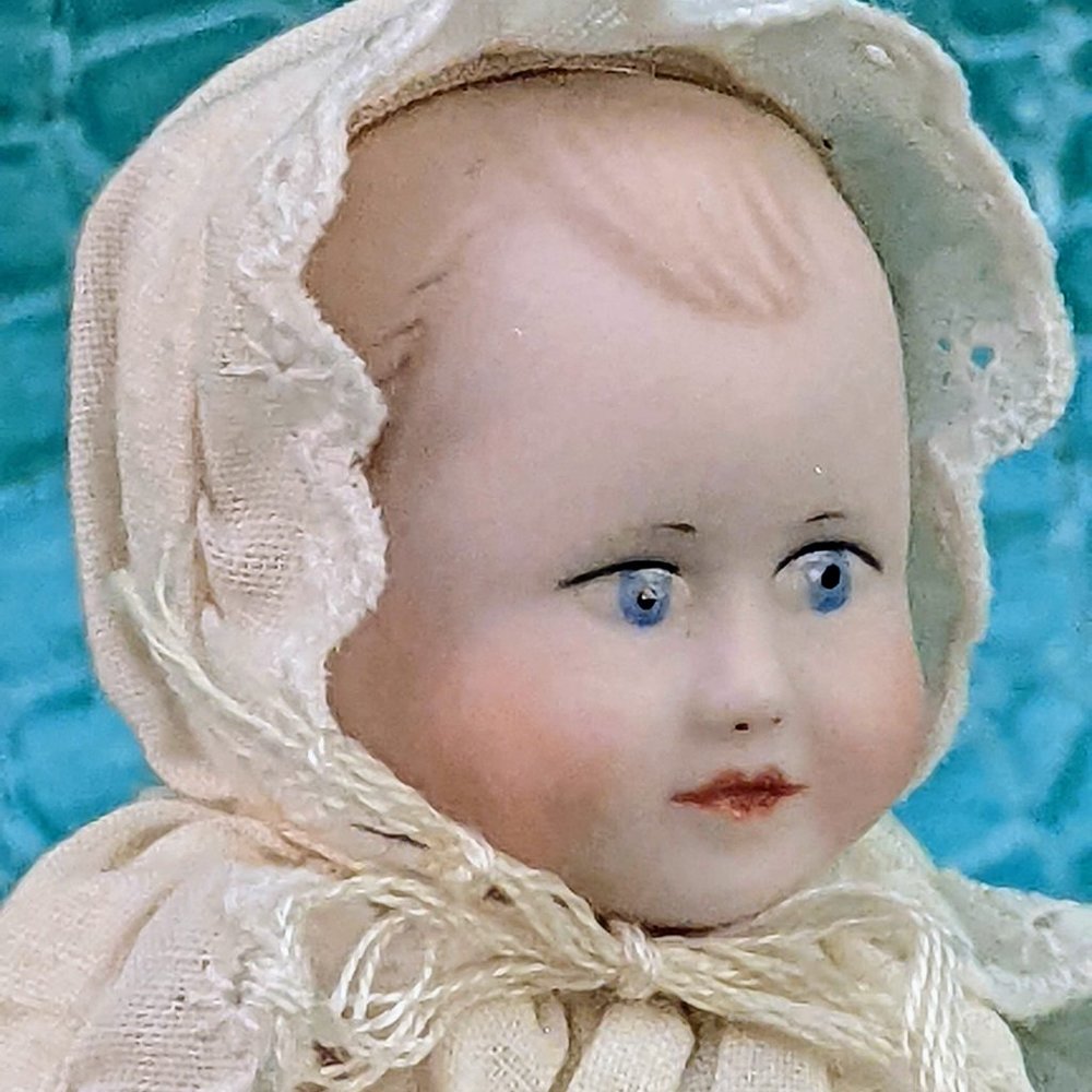 Small vintage artisan Victorian baby doll porcelain and linen hand-made garments